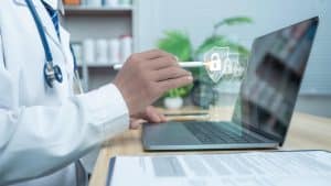 A medical professional with a security icon overlay.