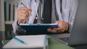 a doctor working on a malpractice case