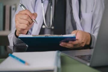 a doctor working on a malpractice case